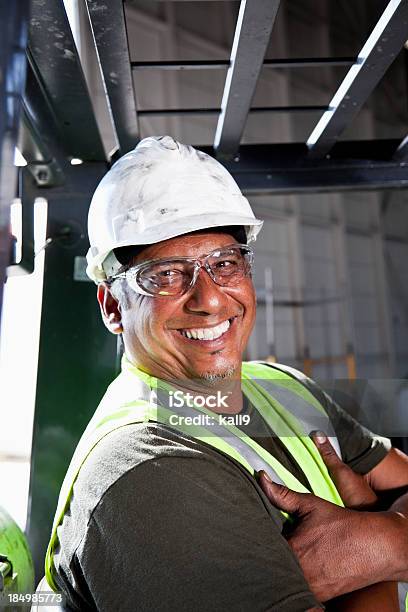 Close Up Of Manual Worker Stock Photo - Download Image Now - Manufacturing Occupation, Latin American and Hispanic Ethnicity, 40-49 Years