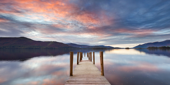 A small jetty in Derwent Water, Lake District, England. This photograph was taken after a long period with lots of rain, the water levels of the lakes were high and the jetties were partially flooded. A seamlessly stitched panoramic image with a total size of 101 megapixels.