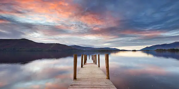 A small jetty in Derwent Water, Lake District, England. This photograph was taken after a long period with lots of rain, the water levels of the lakes were high and the jetties were partially flooded. A seamlessly stitched panoramic image with a total size of 101 megapixels.