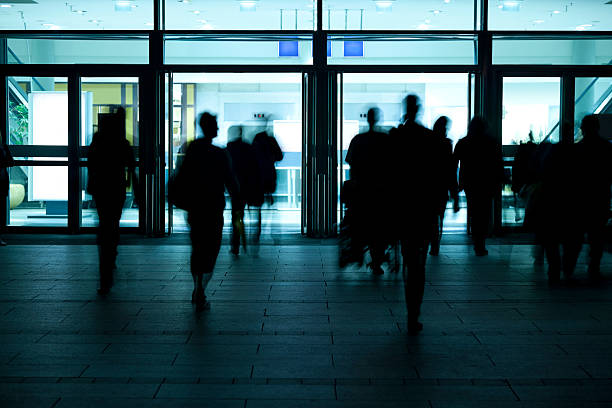 istock People Entering and Exiting Modern Building 184985862