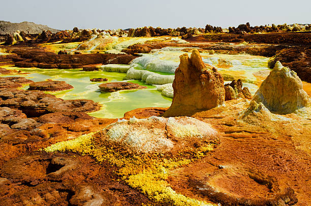 Vulcano Dallol,Ethiopia "Dallol is a volcanic explosion crater in the Danakil Depression, EthiopiaLot of sulphur and hot springs discharging acid liquid and brine.Dallol holds record for highest average temperature for an inhabited location on Earth" dallol ethiopia stock pictures, royalty-free photos & images