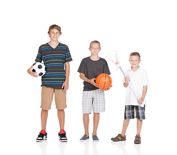 istock Three boys holding sports equipments 184986162