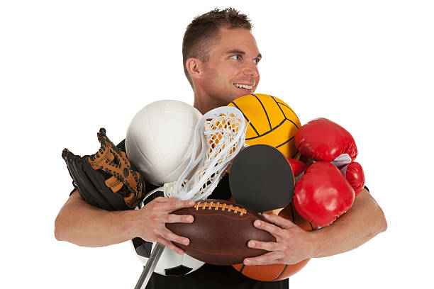 istock Man holding sports equipments 184986499