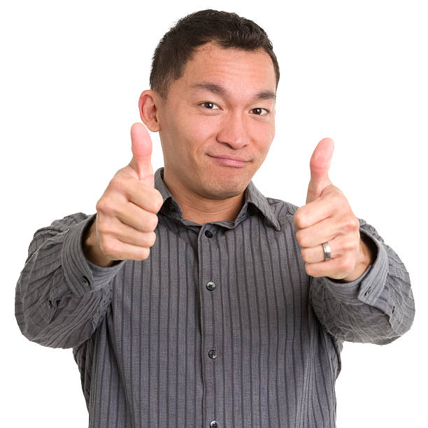istock Asian Man Gives Two Thumbs Up 184986638