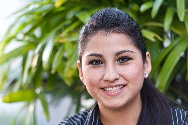 istock Smiling hispanic young woman 184987291
