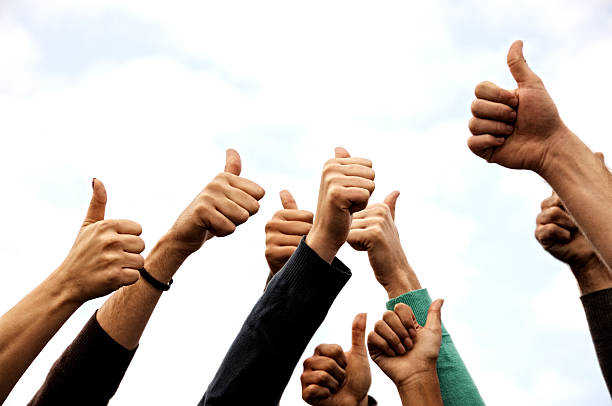 istock Group Of People Thumbs Up 184987323