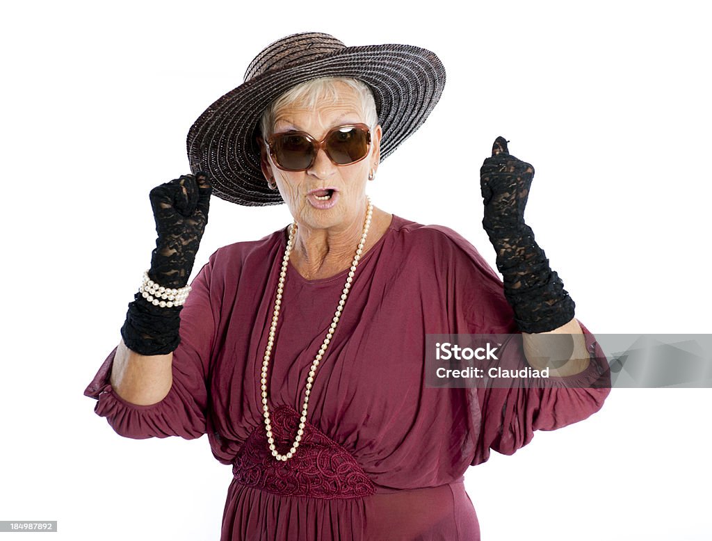 Senior donna con cappello per il sole - Foto stock royalty-free di 65-69 anni