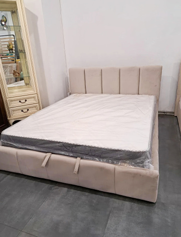 A view of a modern bed in a bedroom