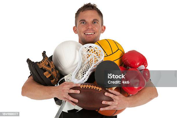 Homem A Segurar Sports Equiments - Fotografias de stock e mais imagens de Figura para recortar - Figura para recortar, Raquete de Lacrosse, 20-29 Anos