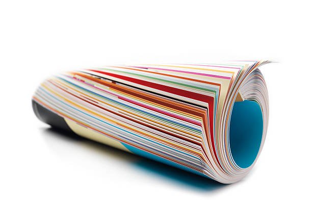 rolled up magazine isolated magazine rolled up rolled up magazine stock pictures, royalty-free photos & images