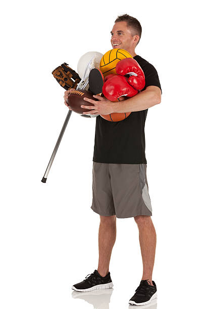istock Man holding sports equiments 184988638