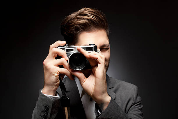 istock Dramatic Portrait of a Photographer 184988994
