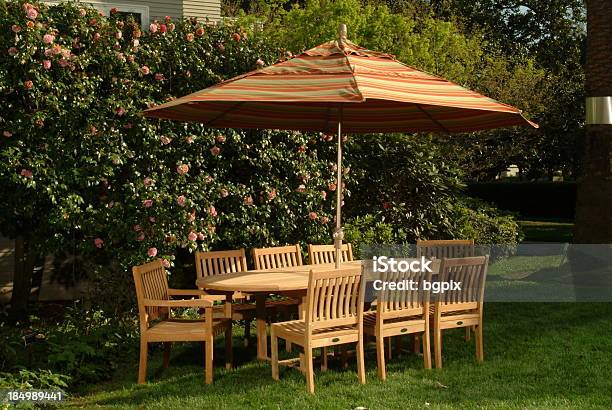 Garden Patio Table With Umbrella Stock Photo - Download Image Now - Chair, Concepts, Design