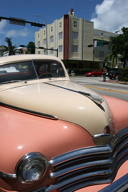 Old car in front or Art Deco hotel