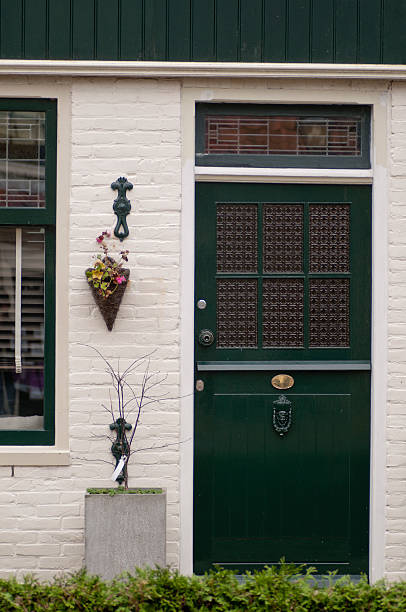 istock View of a green door in Edam, Netherlands 184990199