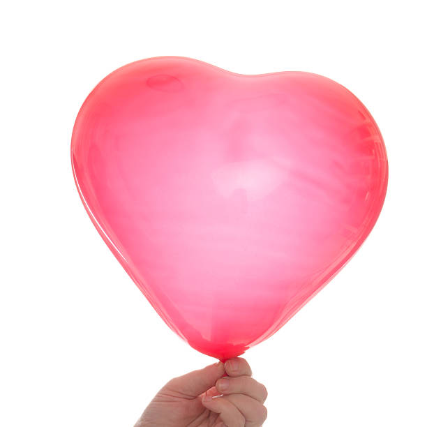 istock Hands holding a red heart shape balloon on white 184990500