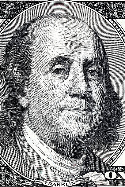 istock One U.S. Dollar with Detail on Benjamin Franklin 184990581
