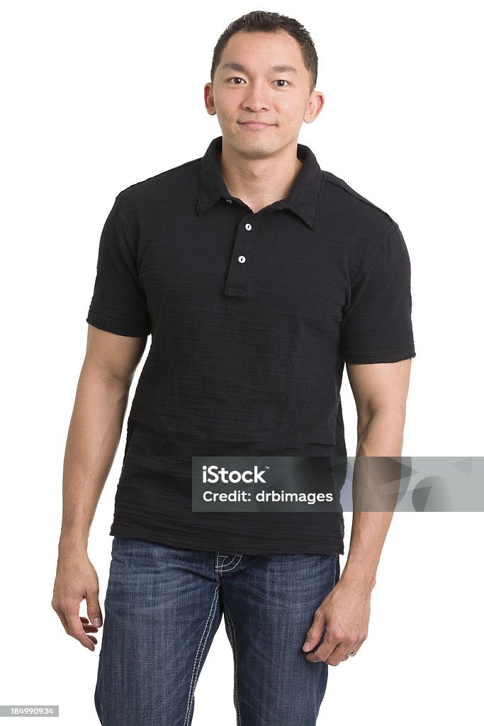 Casual Asian Man Standing Portrait of a young man on a white background. Polo Shirt Stock Photo