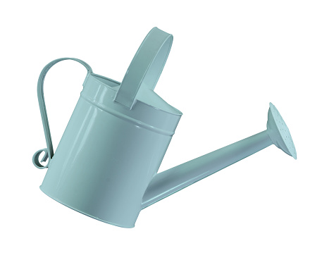 A  light blue watering can.. isolated... with clipping path.