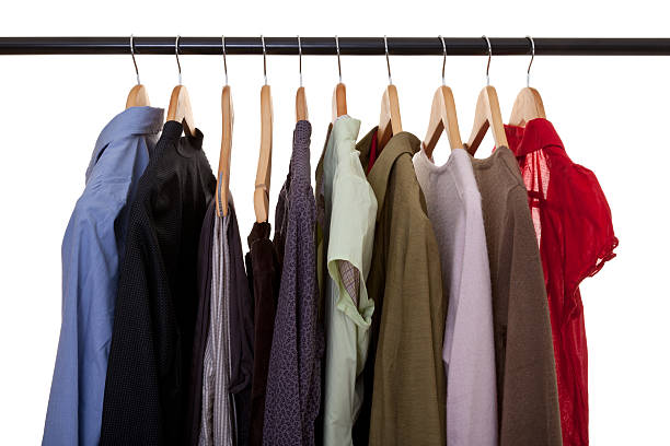istock Clothing hanging in closet 184991054