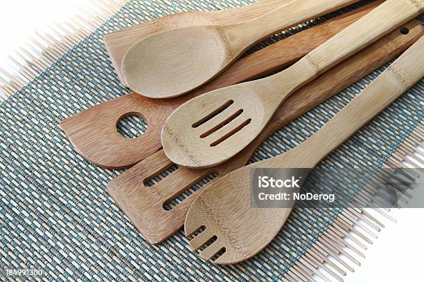 Wood Kitchen Utensils On Green Background Mat Stock Photo - Download Image Now - Bamboo - Material, Color Image, Cooking Utensil
