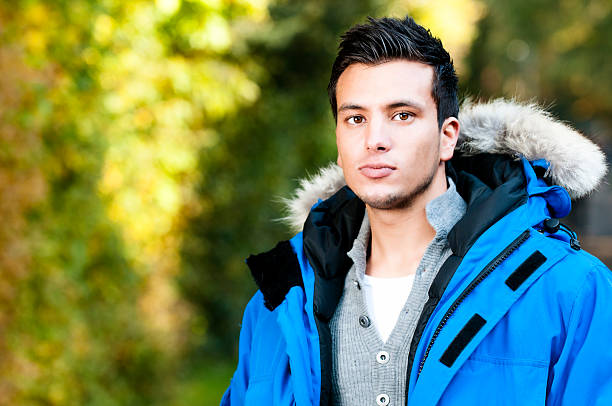 Serious young man in winther clothes