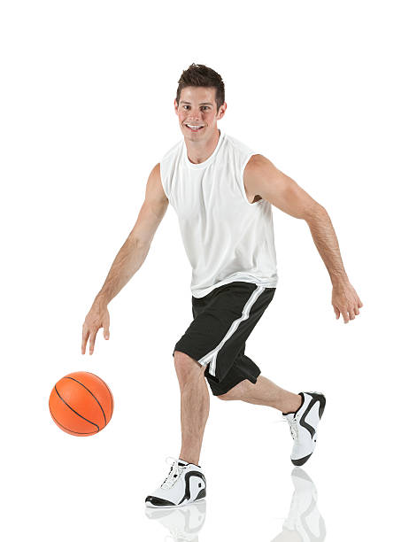 istock Man playing with a basketball 184991890