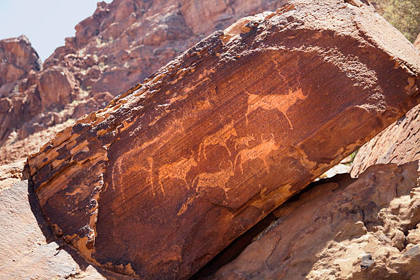 Ancient rock art in Namibia, South Africa stock photo