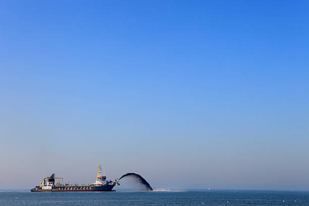 Trailing suction hopper dredge in the Rotterdam harbour.   