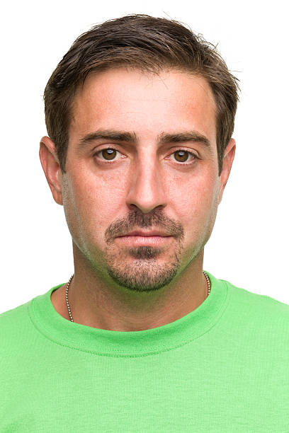 istock Serious Male Headshot Close Up Mug Shot 184993064