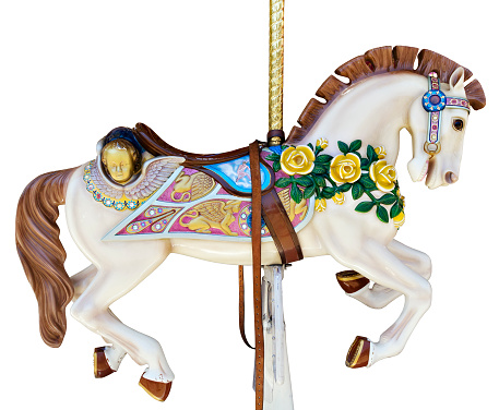 Horses on a carousel in the park