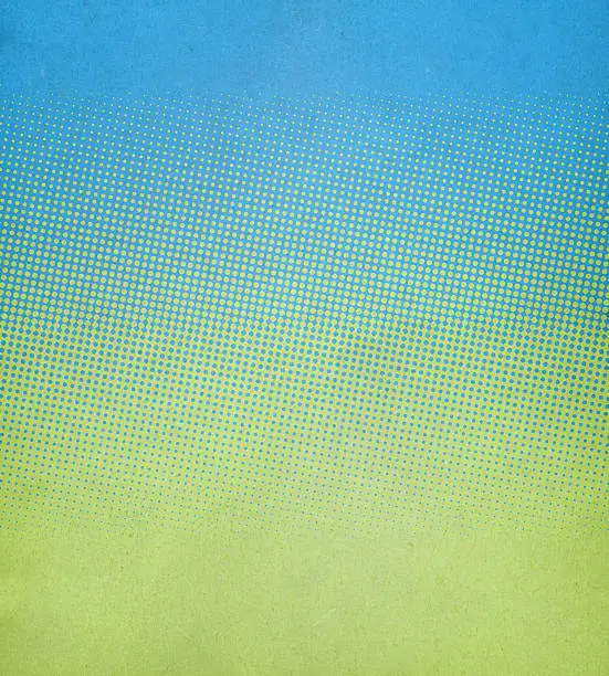 Photo of textured paper with spring colors and halftone