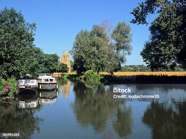 Two Houseboats On River Surrounded By Fields Stock Photo - Download Image Now - Norfolk Broads, Fen, Cambridgeshire