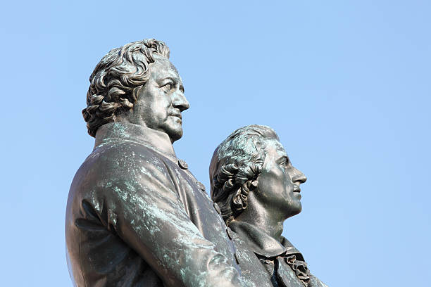 istock poet statues portraits Goethe and Schiller in Weimar from side 184994763