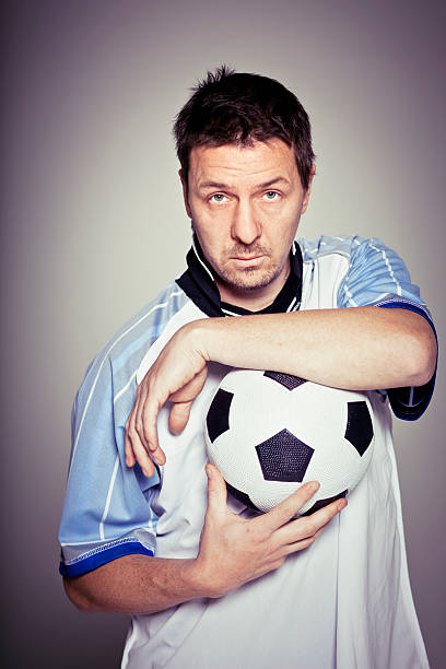 istock Proud football player posing 184995021