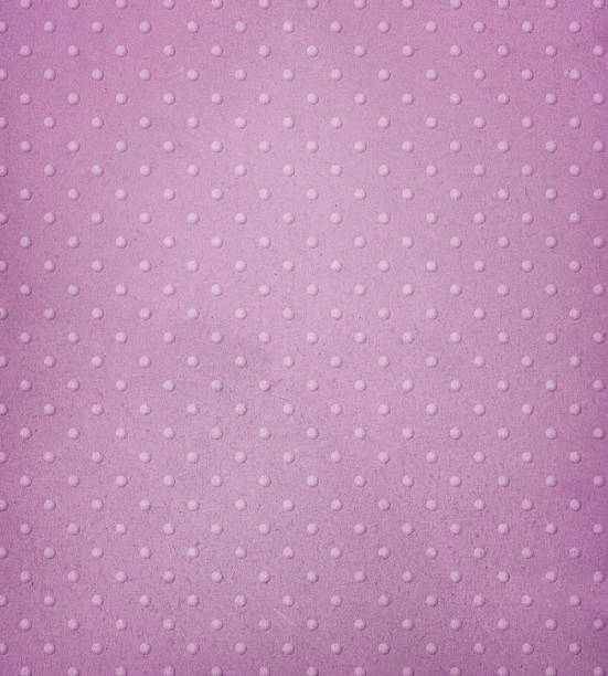 pastel pink paper with raised dots