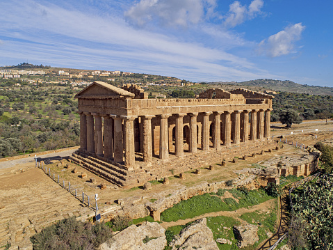 Valley of the Temples and the Temple of Concord, an ancient Greek temple built in the 5th century BC, seen from drone flight. Agrigento, Sicily. Temple of Concordia, Agrigento, Sicily, Italy.