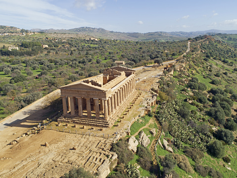 Valley of the Temples and the Temple of Concord, an ancient Greek temple built in the 5th century BC, seen from drone flight. Agrigento, Sicily.