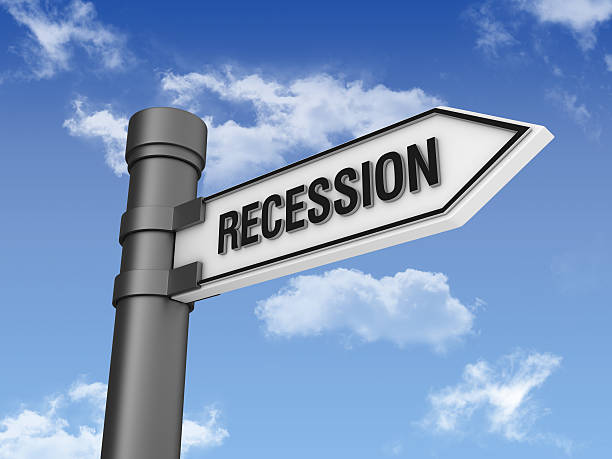 istock Directional Sign with RECESSION and Sky 184996351