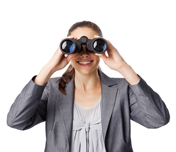 istock Businesswoman Looking Through Binoculars - Isolated 184996406