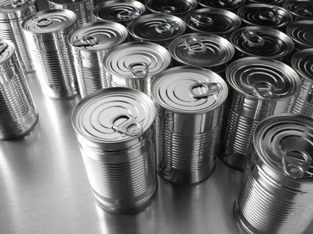 Group silver tins on a stainless steel background.Click on the link below to see more of my tin can images