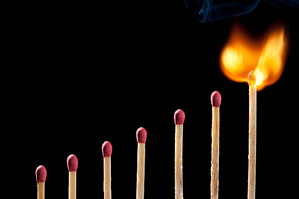istock Ignition of match, with little smoke on black 184996787