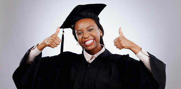 Portrait of young graduate woman on her graduation
