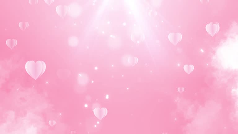 Valentine's Day concept. Hearts floating on a light pink background.