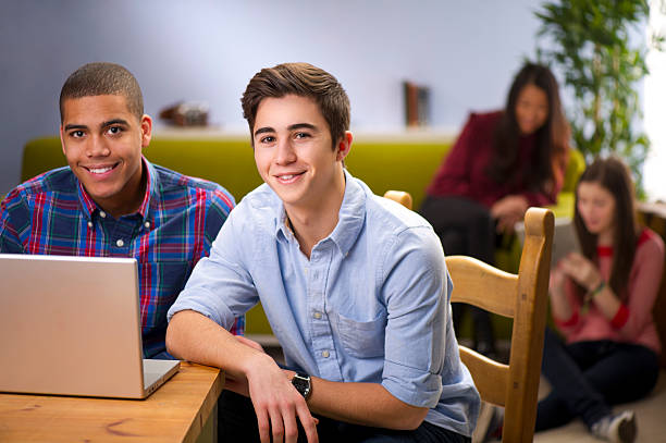 istock Teenagers Checking Out the social Networks 184997280
