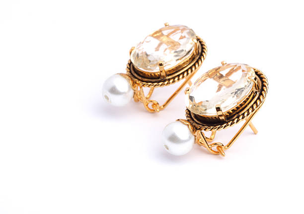 close up with beautiful earrings in black box