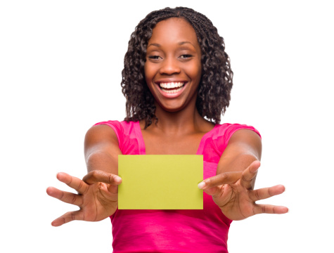 Happy woman holding a business card