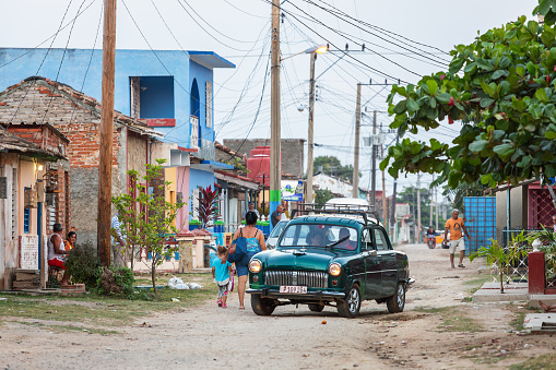 Trinidad, Cuba - March 21, 2017: Trinidad street view with an old car