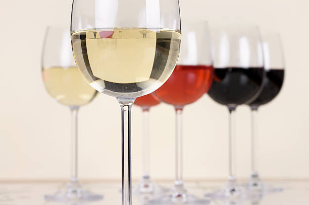 Many empty clean glasses for guests at the buffet festive wedding table.