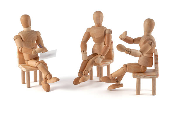 istock wooden mannequin talking 184998688
